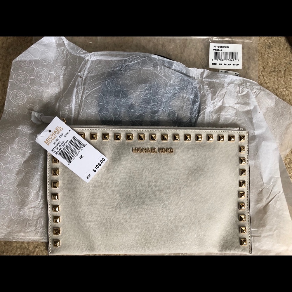 Brand New. Michael Kors Vanilla Leather Clutch